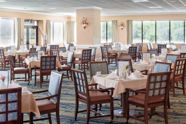 Dining area with tables set for meals