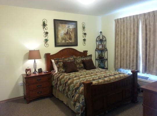 Cozy resident room with bed and decor