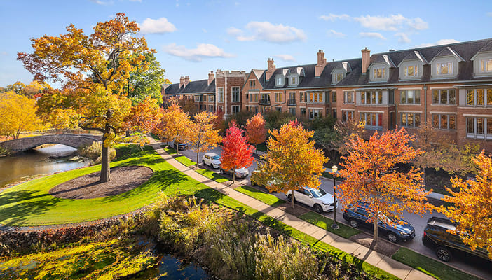Beautiful exterior view of Prairieview at the Garlands surrounded by fall trees