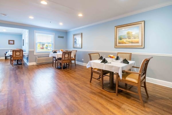 Bright dining room with neatly set tables