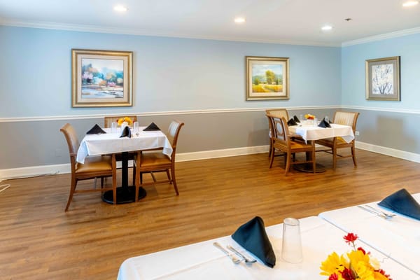 Bright dining room with neatly set tables