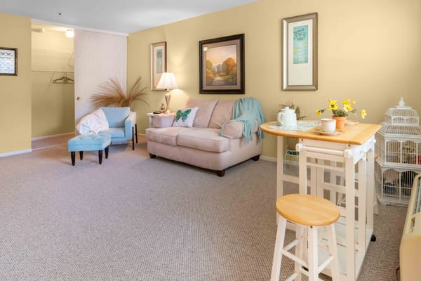 Cozy interior of a resident's room with seating and decor