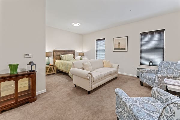 Cozy resident room with seating and decor