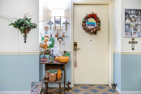 Decorated door in a senior living facility hallway