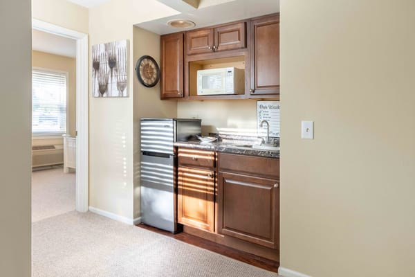 A cozy kitchenette in a private resident room