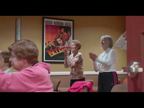 Residents enjoying a lively activity in a communal area