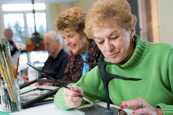 Residents participating in an art activity