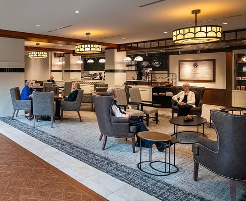 Residents enjoying a common area in the facility