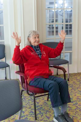 Senior resident participating in an indoor activity