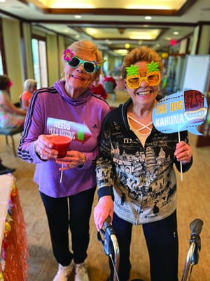 Residents enjoying a fun activity with props