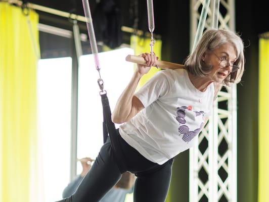 Senior resident engaging in active exercise therapy