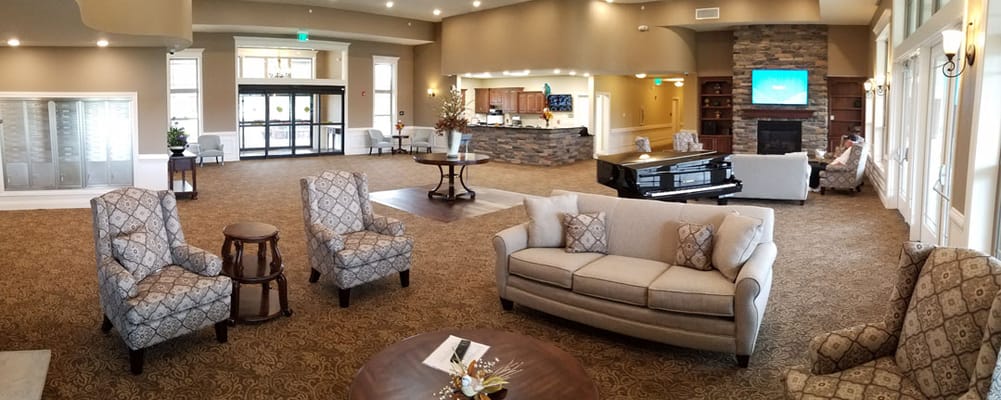 Cozy common area with seating and piano