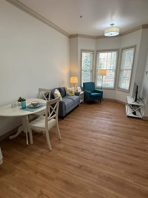 Cozy living space with seating and natural light