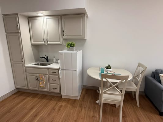 Cozy kitchenette area in a resident's room
