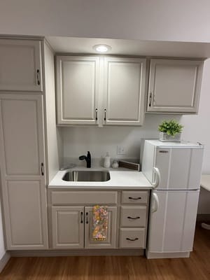Kitchenette area in a resident suite