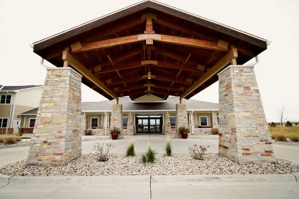 Exterior view of a senior living facility entrance