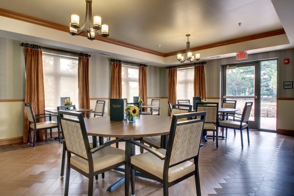 Interior dining area with tables and chairs
