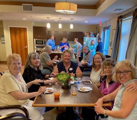 Residents enjoying a group activity in a common area