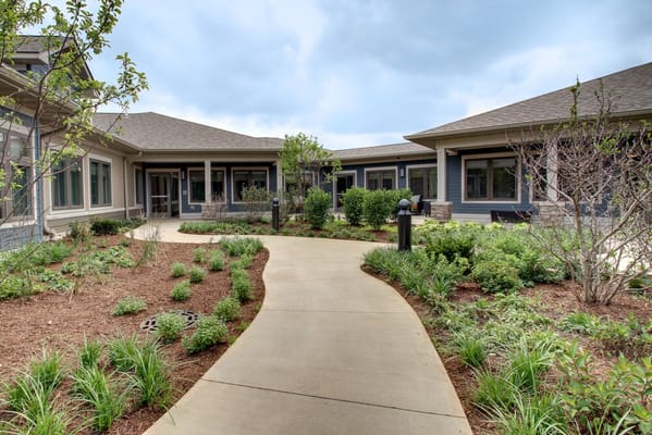 Pathway through a landscaped courtyard at the facility
