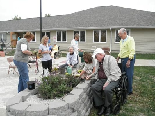 Residents gardening in an outdoor space
