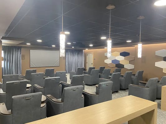 A modern interior view of a common area with seating