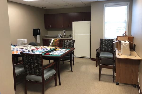 Bright, inviting interior space with a table and chairs