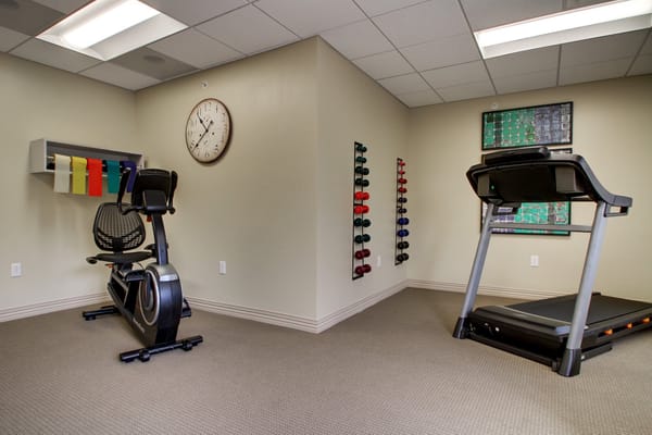 Interior view of a fitness room with exercise equipment