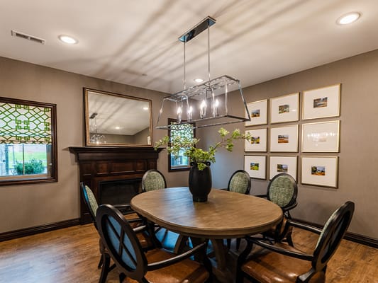 Cozy dining room with a round table and decorations
