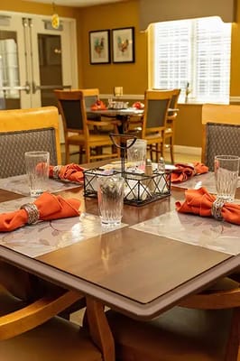 Set dining table in a warm interior space