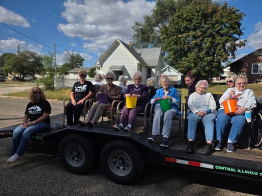 Residents enjoying a day outdoors on a trailer