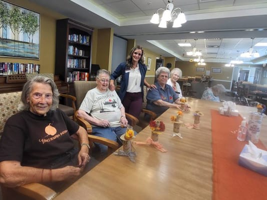 Residents enjoying a social activity in a common area