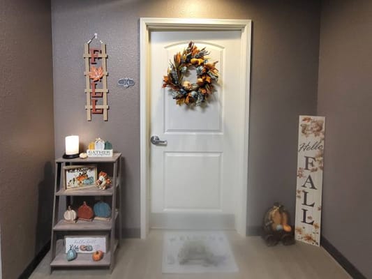Decorative entryway with fall decorations