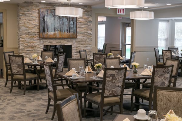 Dining area with tables set for a meal