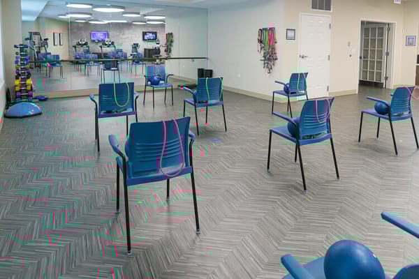 Interior view of a workout area with exercise equipment