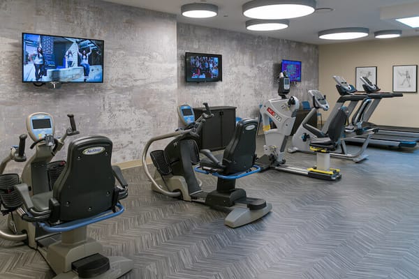 Interior view of a fitness area with exercise equipment