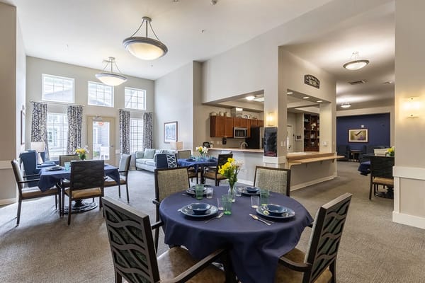 Dining area with tables set for meals