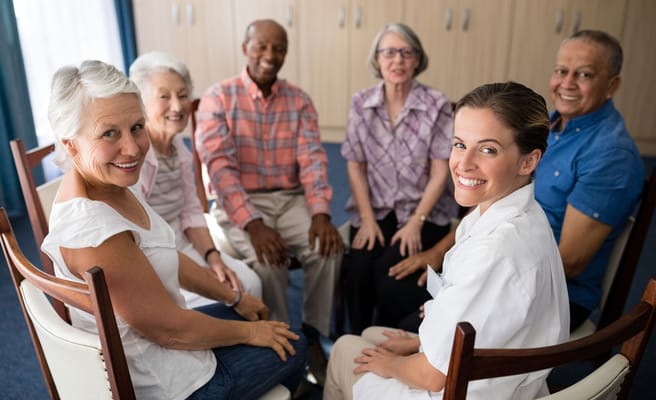 Residents and staff engaged in a group activity