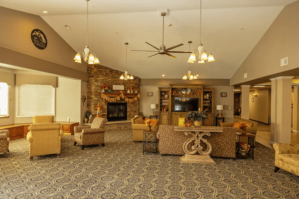 Common area with seating and fireplace