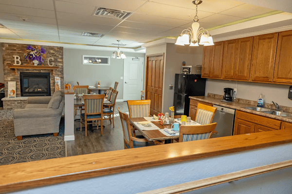 Cozy common area with dining setup and comfortable seating