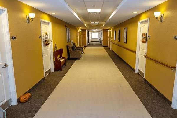 Interior hallway of the facility with decorative walls.