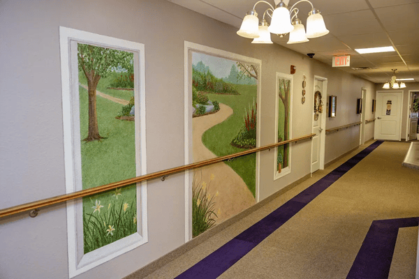 Interior corridor with mural of nature scenes