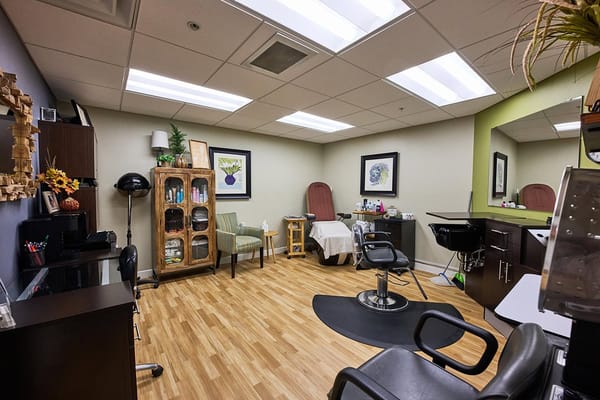 Spa room with styling chairs and decor