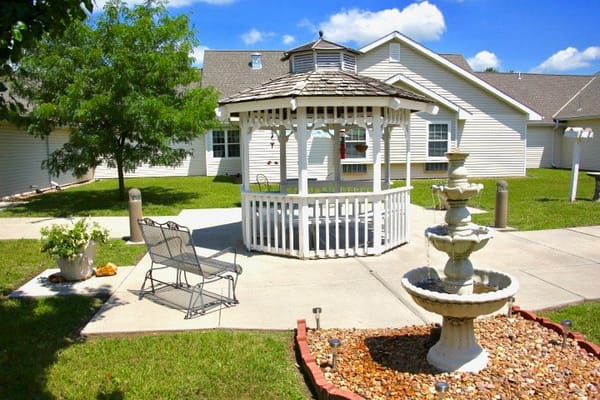 Outdoor courtyard with gazebo and fountain