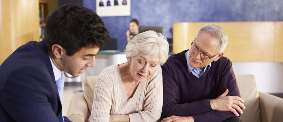 Residents interacting with staff in a common area