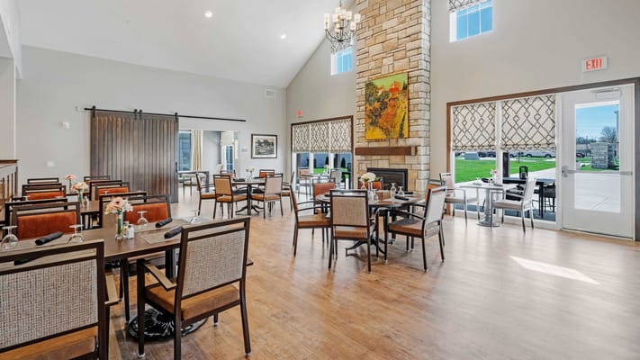 Bright and inviting dining room with tables and chairs