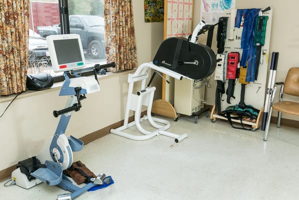 Physical therapy equipment in a facility room