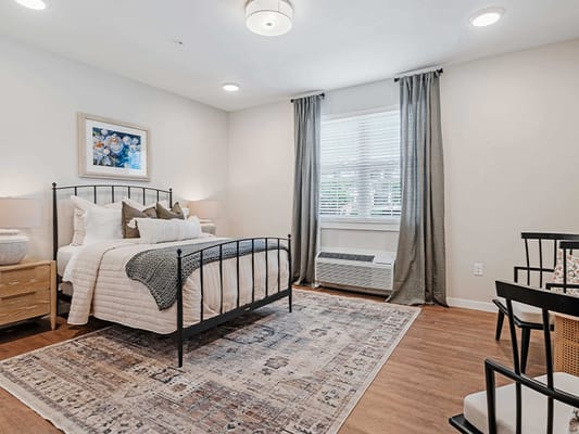 Bright, welcoming bedroom in a senior living facility
