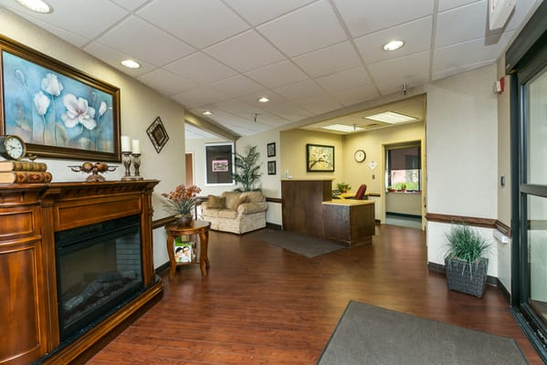 Welcoming lobby area with seating and fireplace