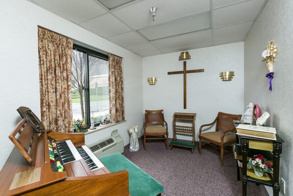 Cozy lounge area with piano and seating