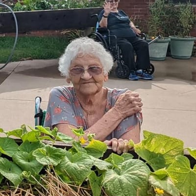 Residents gardening in an outdoor area